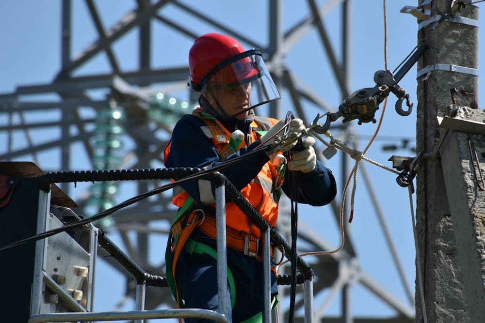 Engineer working on power lines
